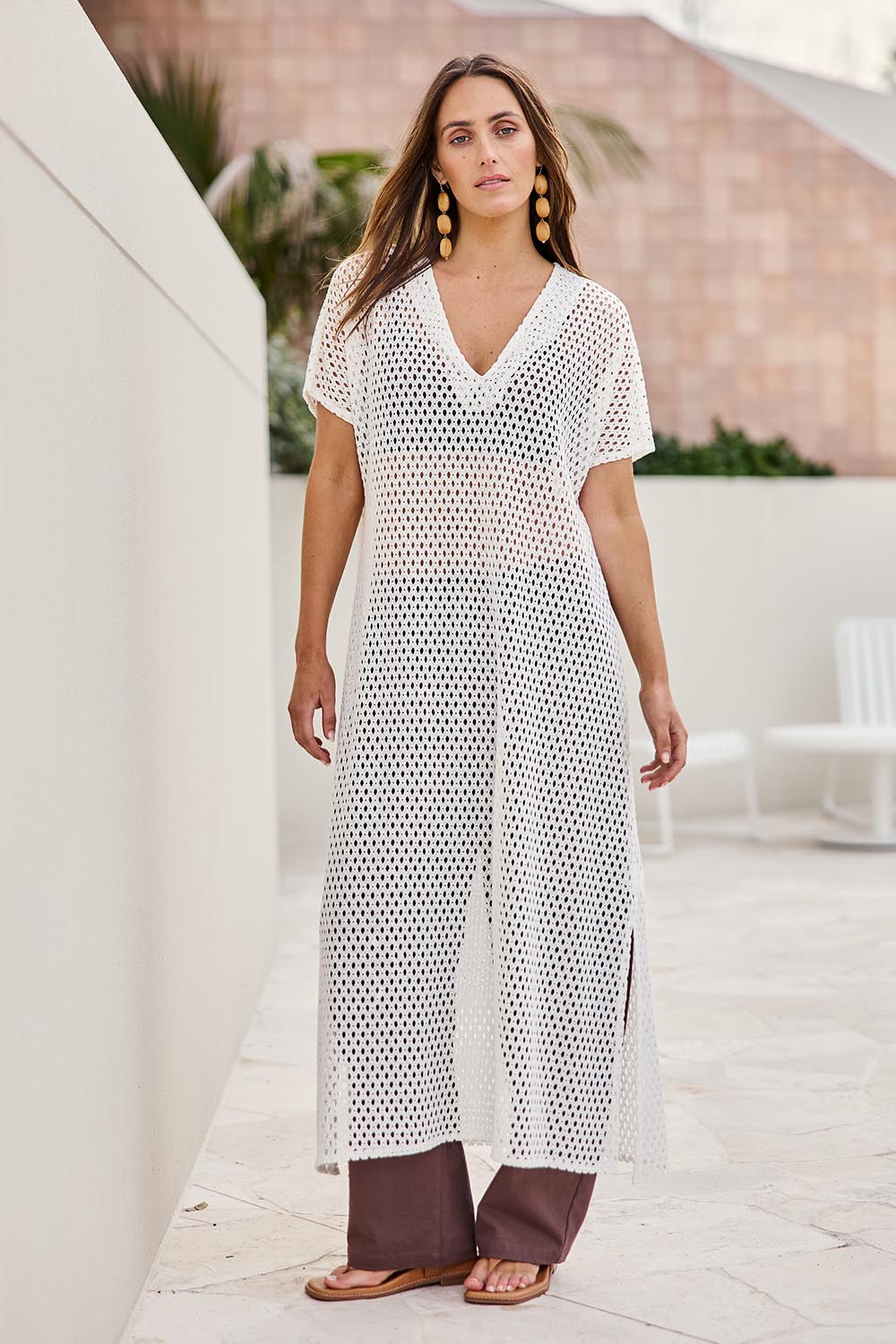 Model Tegand wearing size 10 of the Wear Your Own Way Maxi Dress – White in colour White, from the front