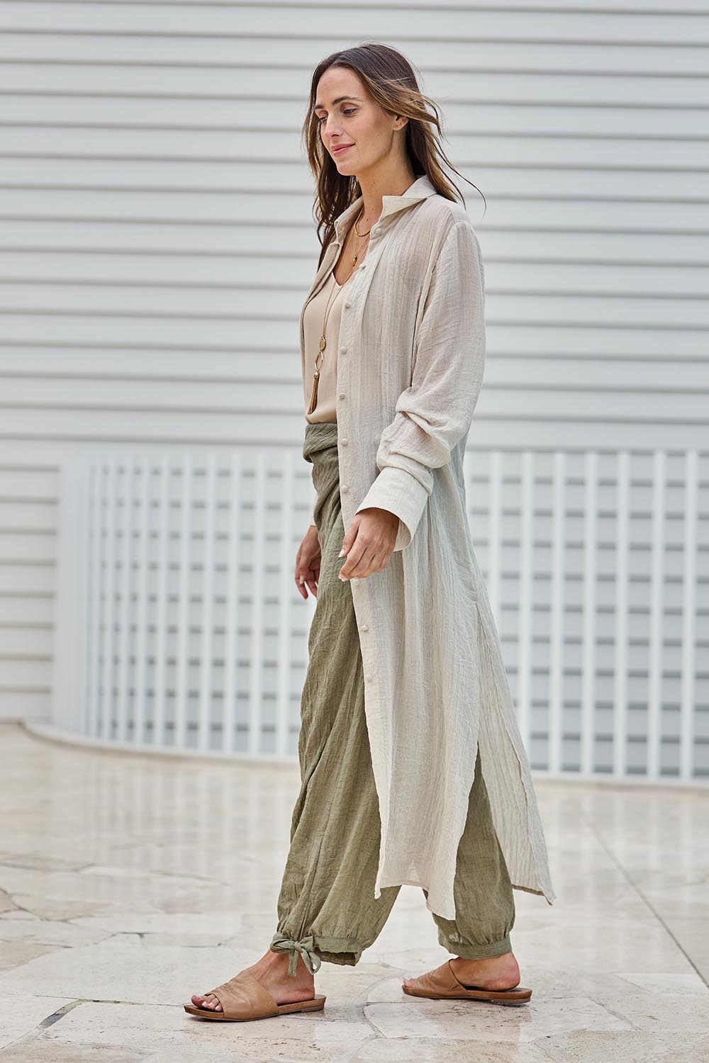 Model Tegand wearing size 10 of the Floating Through The Day Maxi Shirt - Sand in colour Sand, from the front