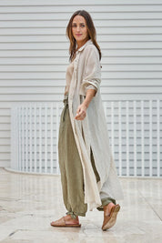 Model Tegand wearing size 10 of the Floating Through The Day Maxi Shirt - Sand in colour Sand, from the front