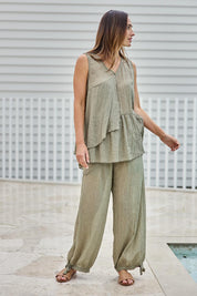 Model Tegand wearing size 10 of the Floating Through The Day Pants  - Olive in colour Olive, from the front