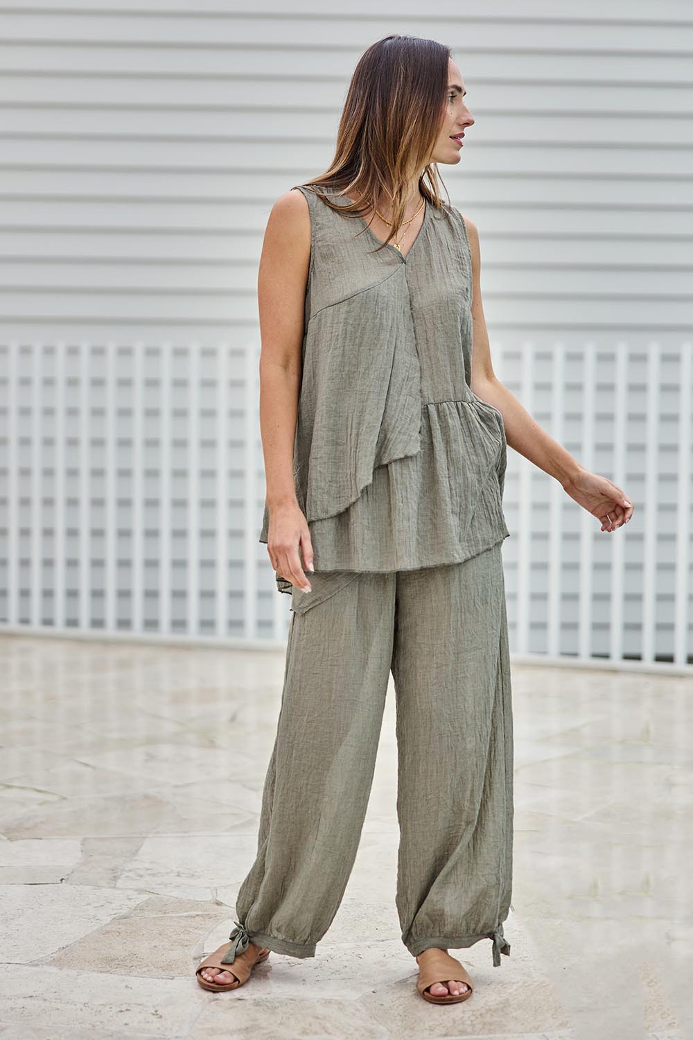 Model Tegand wearing size 10 of the Floating Through The Day Pants  - Olive in colour Olive, from the front