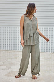 Model Tegand wearing size 10 of the Floating Through The Day Pants  - Olive in colour Olive, from the front