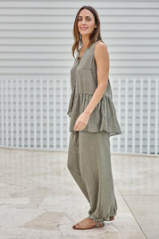 Model Tegand wearing size 10 of the Floating Through The Day Pants  - Olive in colour Olive, from the front
