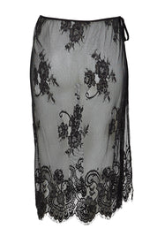 Product shot of the Last Dance Lace Overlay Skirt - Black in colour Black, from the back
