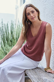 Model Tegand wearing size 10 of the Golden Hour Knit Tank - Rosewood in colour Rosewood, from an angle