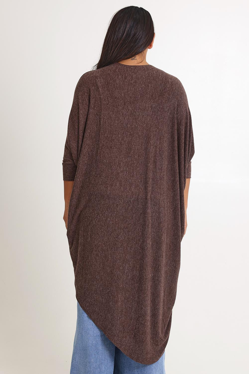 Model Ashleigh wearing size 16 of the Falling For You Cardi in colour Chocolate, from the back