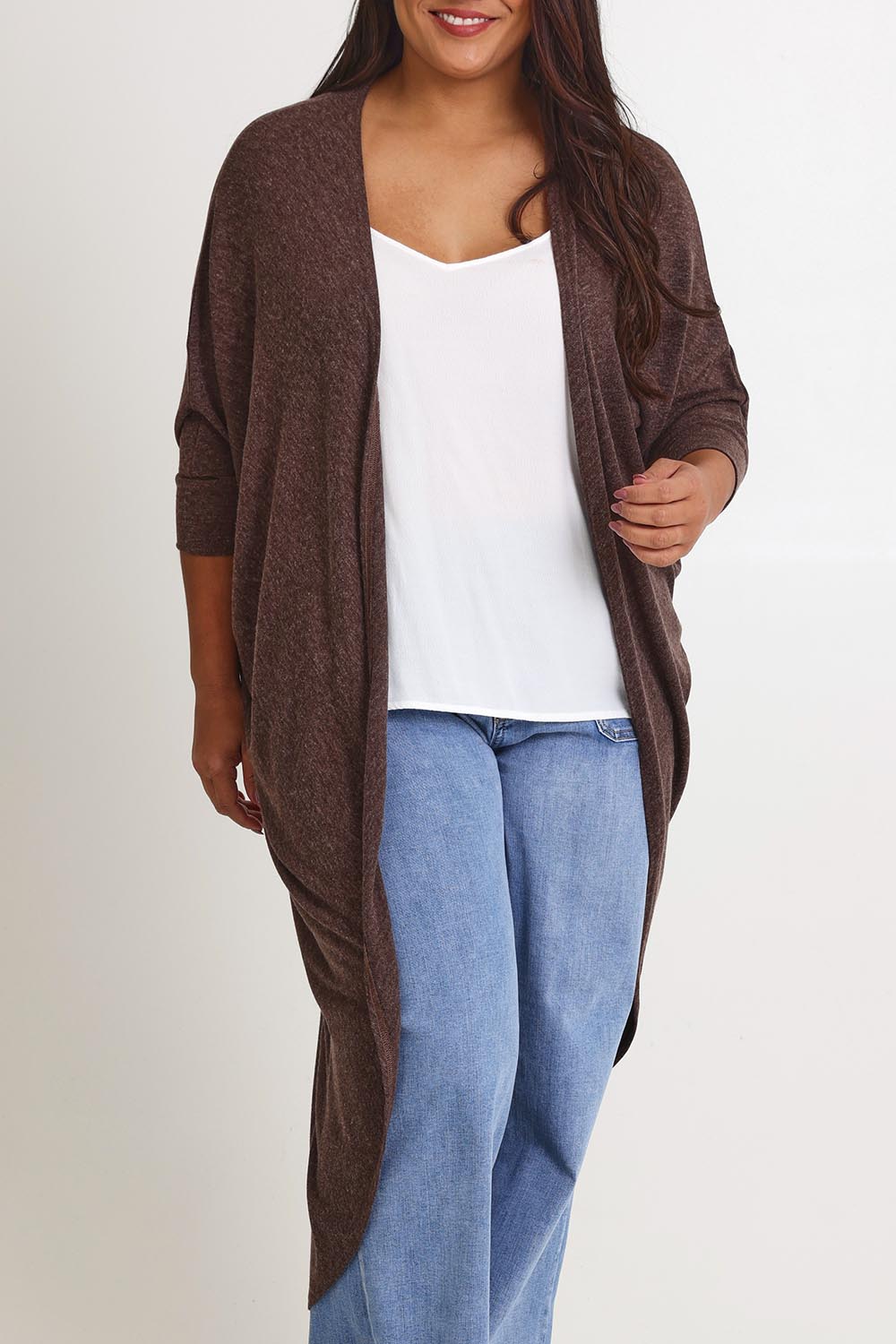 Model Ashleigh wearing size 16 of the Falling For You Cardi in colour Chocolate, from the front, cropped image
