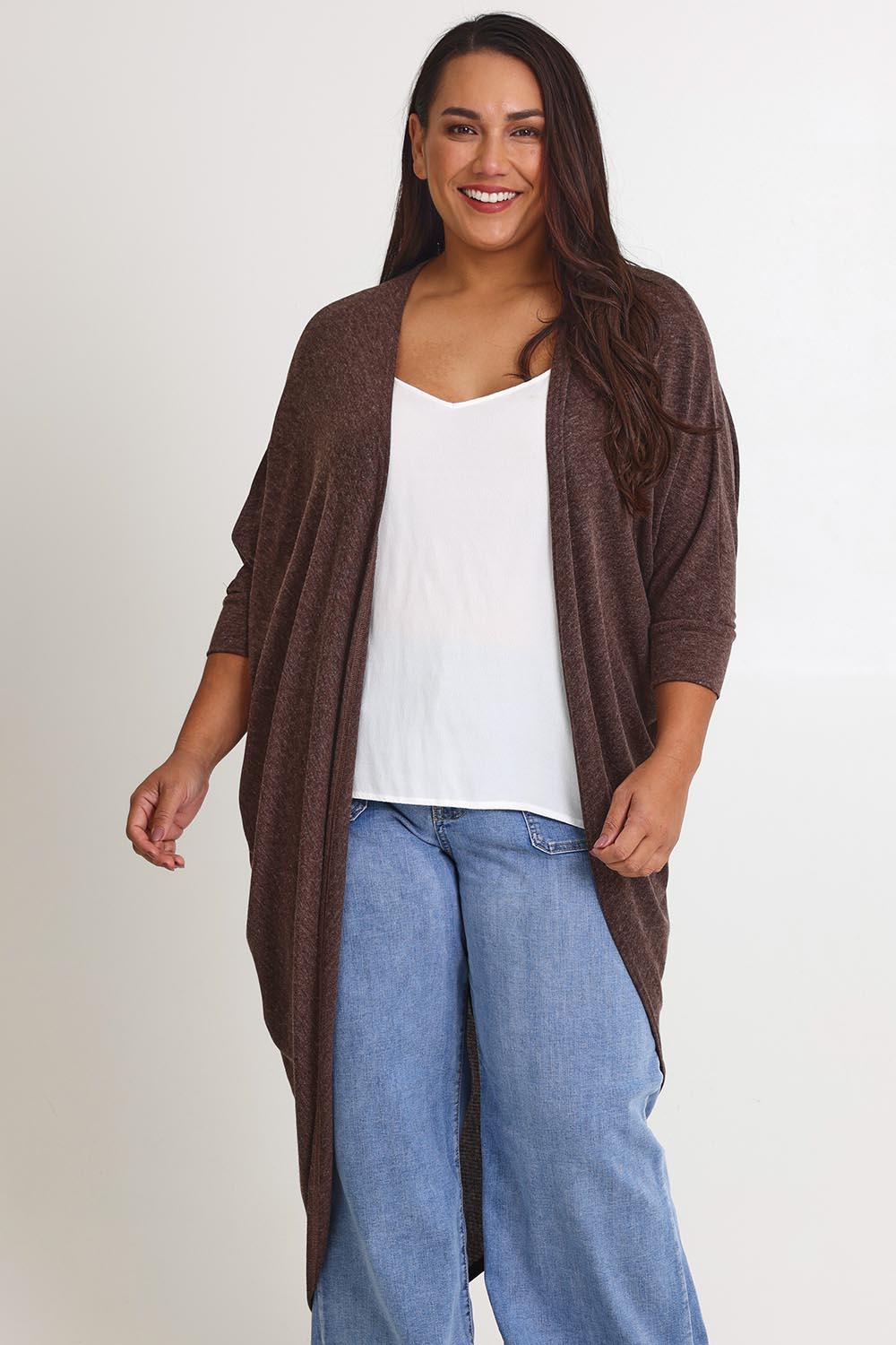 Model Ashleigh wearing size 16 of the Falling For You Cardi in colour Chocolate, from the front, cropped image