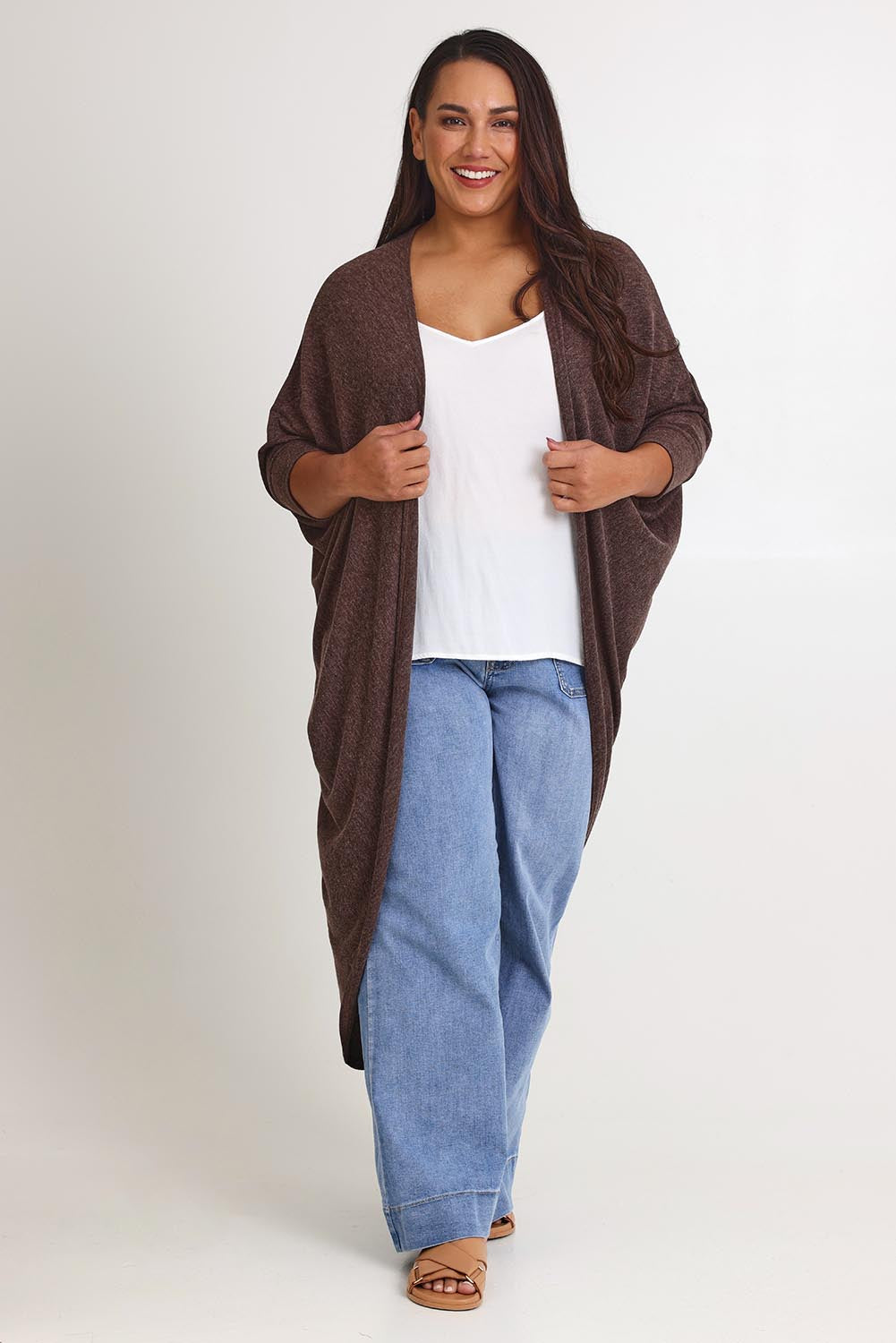 Model Ashleigh wearing size 16 of the Falling For You Cardi in colour Chocolate, from the front, showing the whole outfit