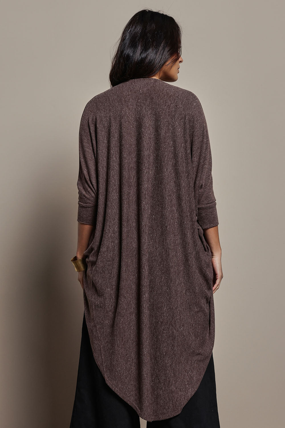 Model Tahnee wearing size 10 of the Falling For You Cardi in colour Chocolate, from the back