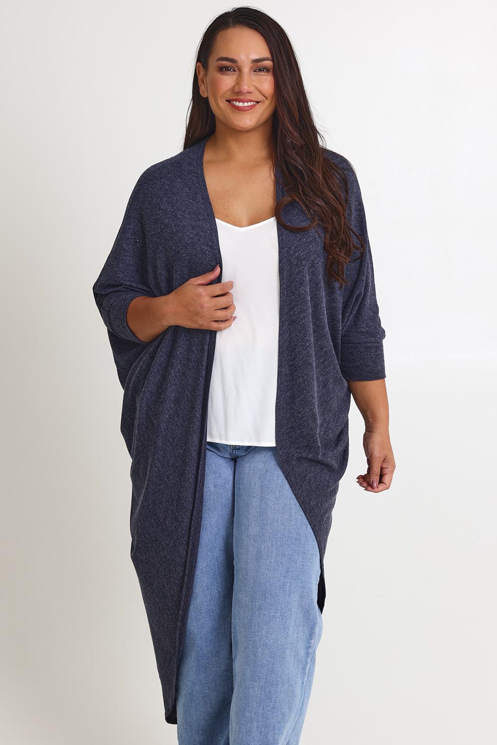 Model Ashleigh wearing size 16 of the Falling For You Cardi in colour Denim (Blue), from the front, cropped image