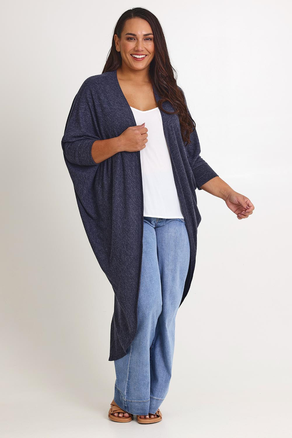 Model Ashleigh wearing size 16 of the Falling For You Cardi in colour Denim (Blue), from the front, showing the whole outfit