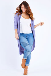Model Laura wearing size 14 of the Falling For You Cardi in colour Dusk (Blue), from the front, showing the whole outfit