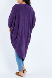 Model Sasha-Lee wearing size 16 of the Falling For You Cardi in colour Grape (Purple), from the back
