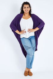 Model Sasha-Lee wearing the Falling For You Cardi in colour Grape (Purple), from the front, showing the whole outfit