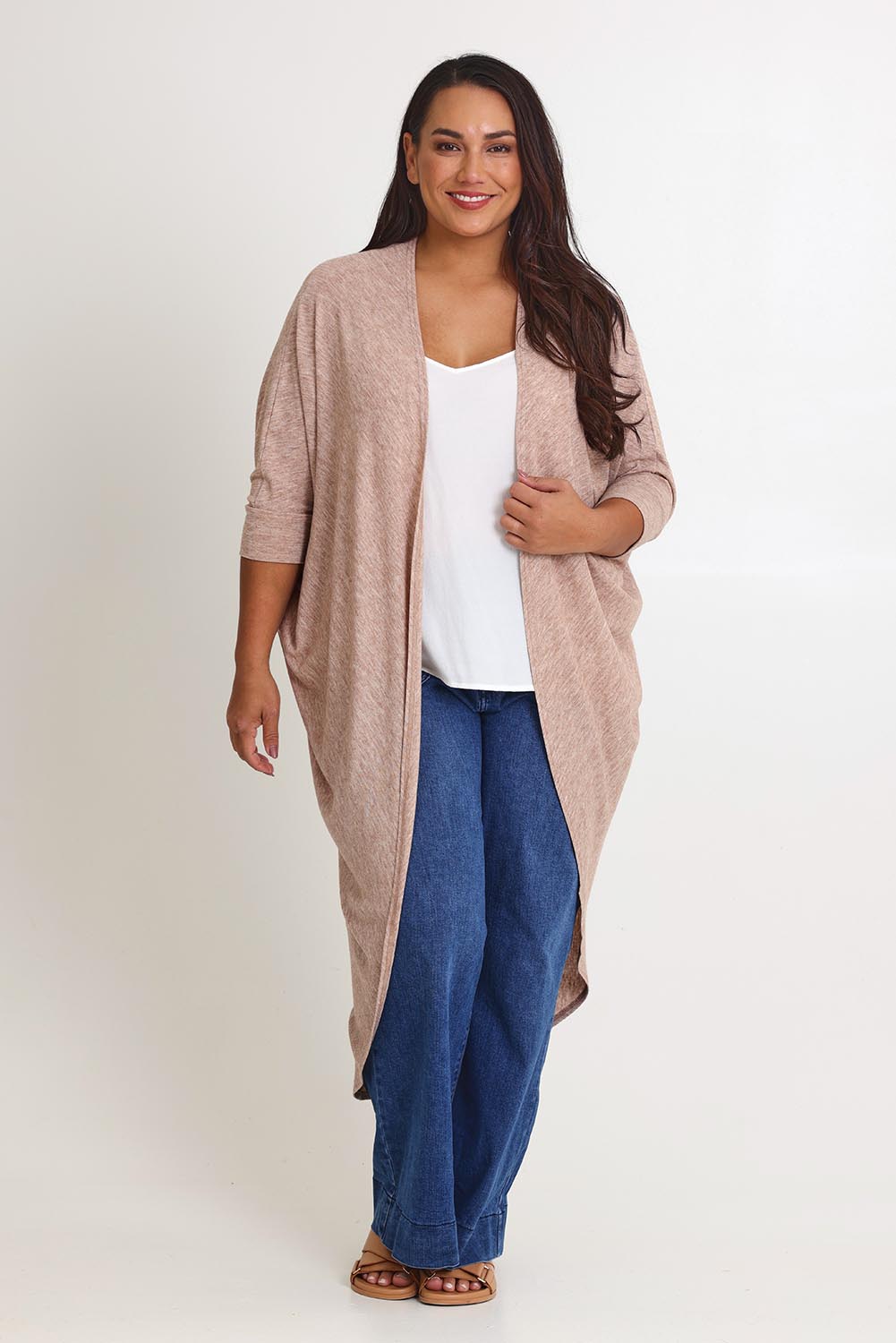 Model Ashleigh wearing size 16 of the Falling For You Cardi in colour Natural, from the front, showing the whole outfit