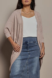 Model Tahnee wearing size 10 of the Falling For You Cardi in colour Natural, from the front, cropped image