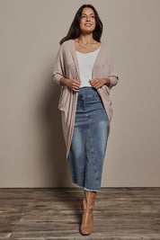 Model Tahnee wearing size 10 of the Falling For You Cardi in colour Natural, from the front, showing the whole outfit