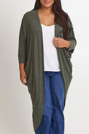 Model Ashleigh wearing size 16 of the Falling For You Cardi in colour Pine (Green), from the front, cropped image