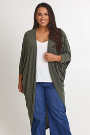 Model Ashleigh wearing size 16 of the Falling For You Cardi in colour Pine (Green), from the front, cropped image