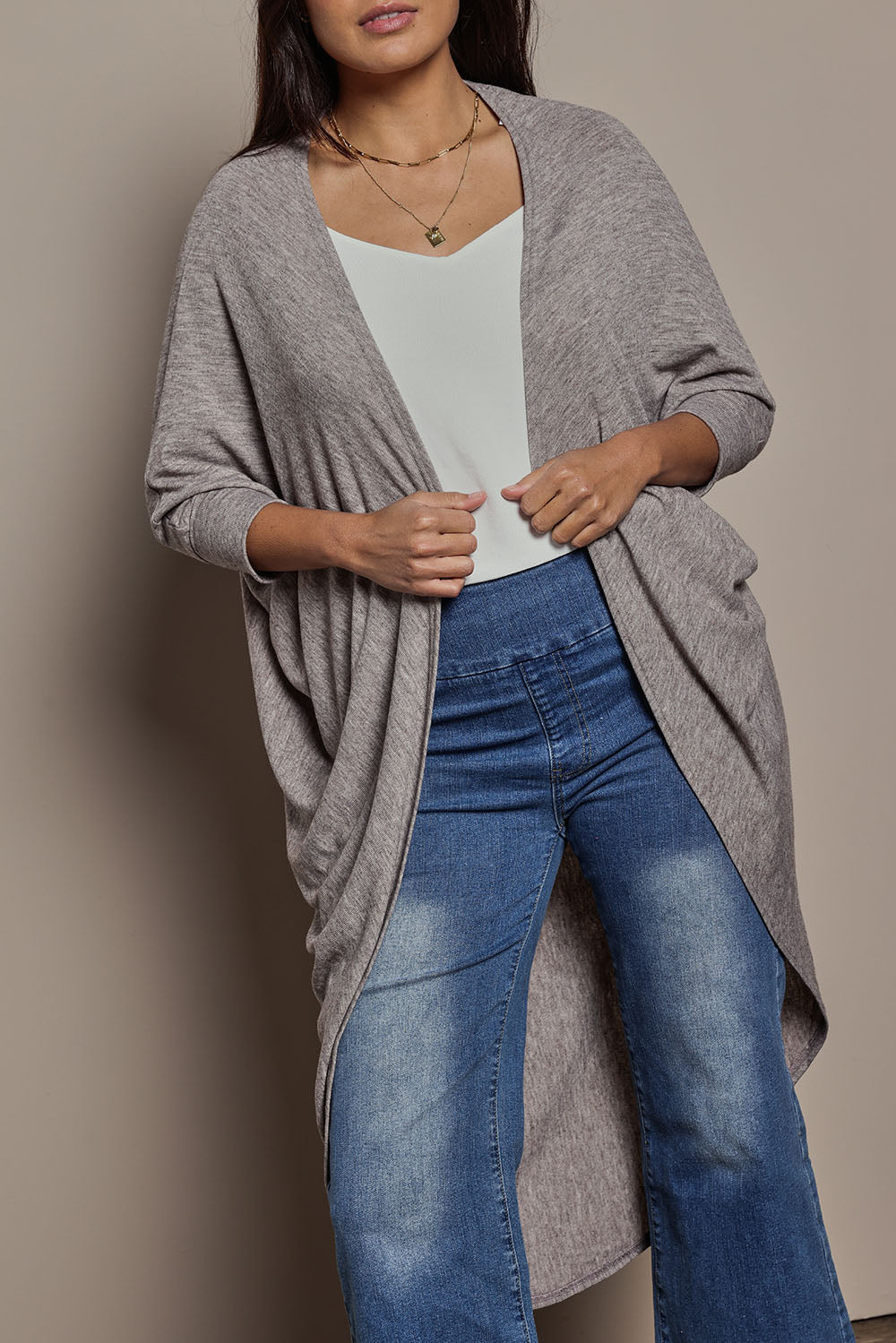 Model Tahnee wearing size 10 of the Falling For You Cardi in colour Rock, from the front, cropped image