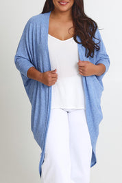 Model Ashleigh wearing size 16 of the Falling For You Cardi in colour Sky (Blue), from the front, cropped image