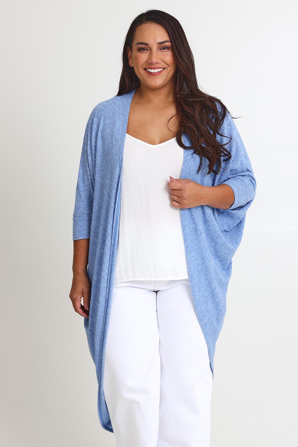 Model Ashleigh wearing size 16 of the Falling For You Cardi in colour Sky (Blue), from the front, cropped image