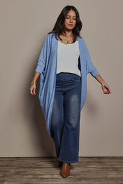 Model Tahnee wearing size 10 of the Falling For You Cardi in colour Sky (Blue), from the front, showing the whole outfit