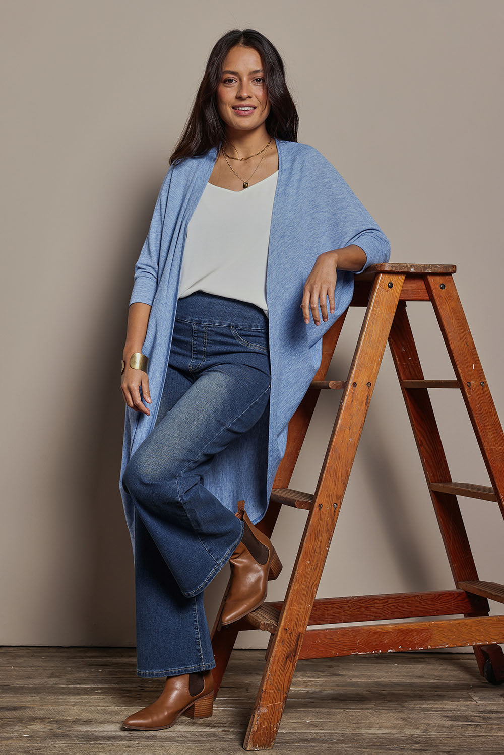 Model Tahnee wearing size 10 of the Falling For You Cardi in colour Sky (Blue), from the front, showing the whole outfit