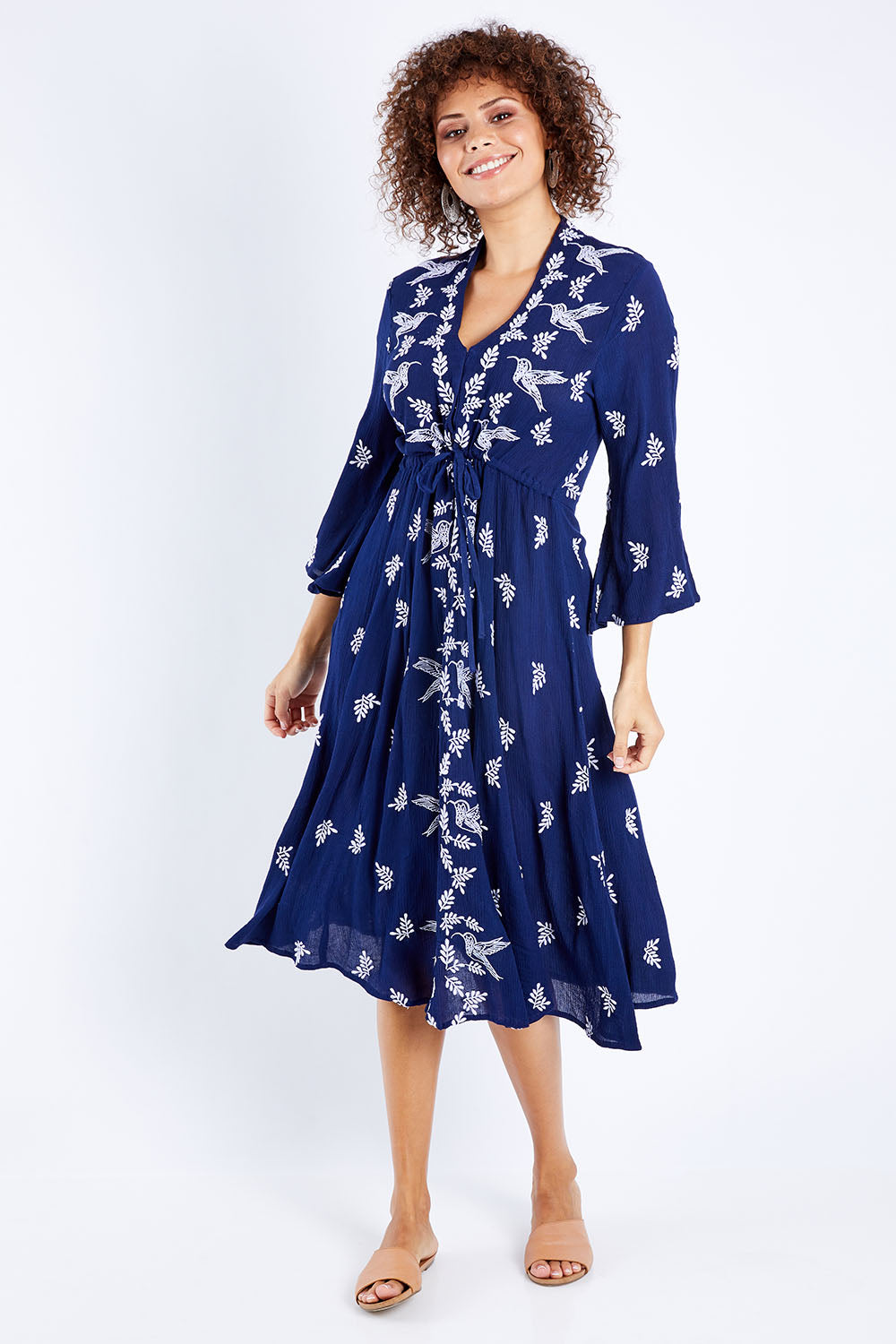 Model Lala wearing size 10 of the Dancing With Birds Midi Dress in colour Deepblue (Blue), from the front, showing the whole outfit