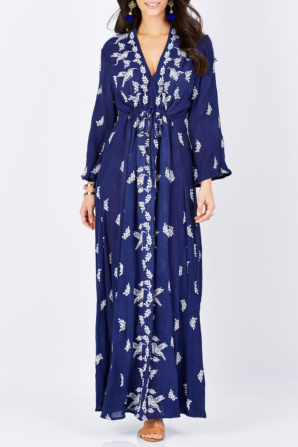 Model Georgia wearing size 10 of the Dancing With Birds Dress in colour DeepBlue (Blue), from the front, cropped image