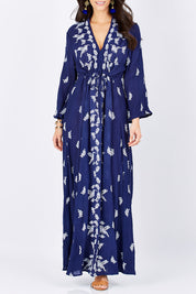 Model Georgia wearing size 10 of the Dancing With Birds Dress in colour DeepBlue (Blue), from the front, cropped image