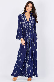 Model Georgia wearing size 10 of the Dancing With Birds Dress in colour DeepBlue (Blue), from the front, showing the whole outfit