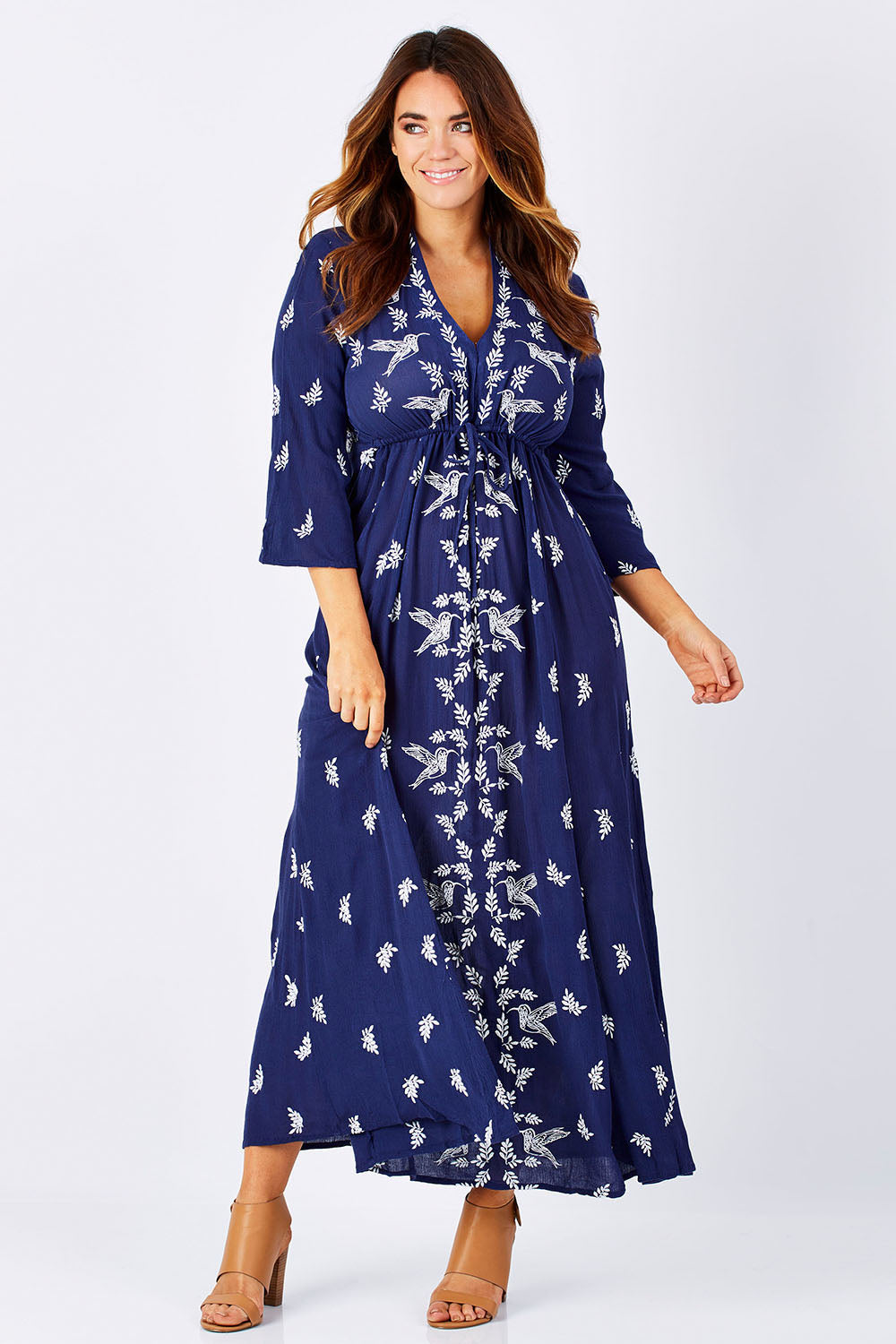 Model Laura wearing size 12 of the Dancing With Birds Dress in colour DeepBlue (Blue), from the front, showing the whole outfit
