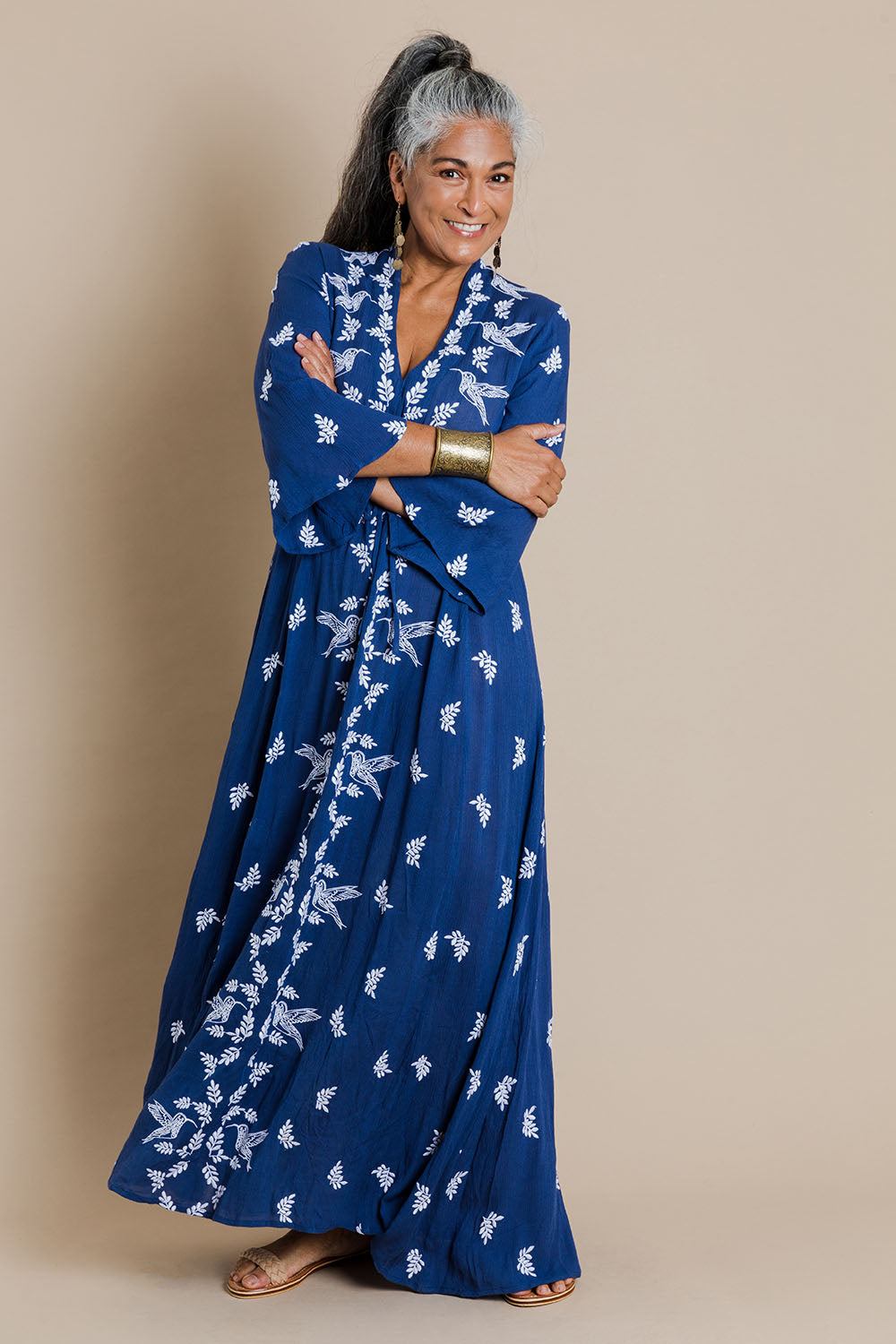 Model Nadine wearing size 10 of the Dancing With Birds Dress in colour DeepBlue (Blue), from the front, showing the whole outfit