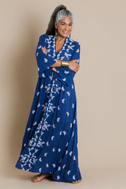 Model Nadine wearing size 10 of the Dancing With Birds Dress in colour DeepBlue (Blue), from the front, showing the whole outfit
