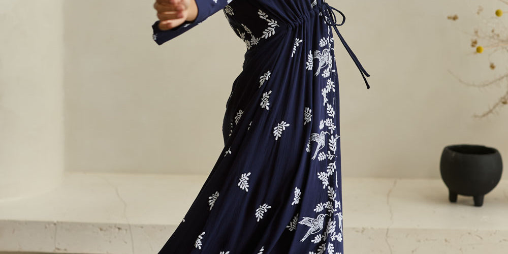 Model Tahnee wearing size 10 of the Dancing With Birds Dress in colour DeepBlue (Blue), from the front, showing the whole outfit