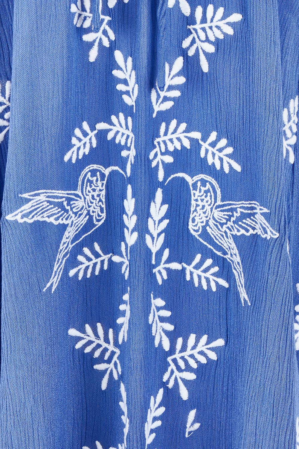 Product shot of the Dancing With Birds Dress in colour Persian (Blue), detail