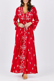 Model Georgia wearing size 10 of the Dancing With Birds Dress in colour Scarlet (Red), from the front, cropped image