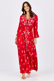 Model Georgia wearing size 10 of the Dancing With Birds Dress in colour Scarlet (Red), from the front, showing the whole outfit