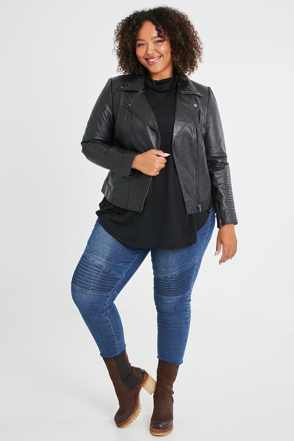 Model Alexis wearing size 16 of the Urban Nomad Leather Jacket in colour Black (Black), from the front, showing the whole outfit