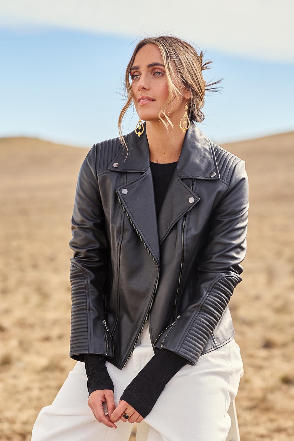 Model Tegan wearing size 10 of the Urban Nomad Leather Jacket in colour Black (Black), from the front, showing the whole outfit