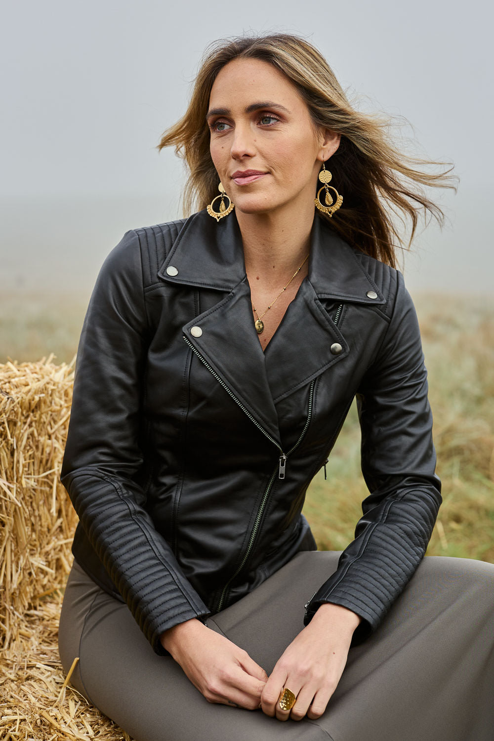 Model Tegan wearing size 10 of the Urban Nomad Leather Jacket in colour Black (Black), from the front, showing the whole outfit