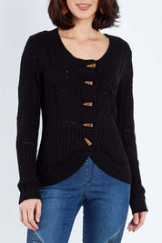 Model Andrea wearing size S of the Fireside Button Cardigan in colour Black (Black), from the front, cropped image