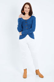 Model Andrea wearing size S of the Fireside Button Cardigan in colour Bluejean (Blue), from the front, showing the whole outfit