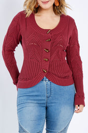 Model Jess wearing size L of the Fireside Button Cardigan in colour Plum (Red), from the front, cropped image