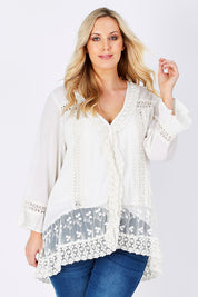 Model Jess wearing size 14 of the Whispers In The Dark Shirt in colour Milk (White), from the front, cropped image