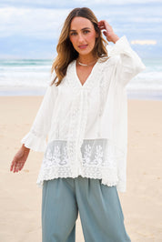 Model Tegan wearing size 10 of the Whispers In The Dark Shirt in colour Milk (White), from the front, showing the whole outfit