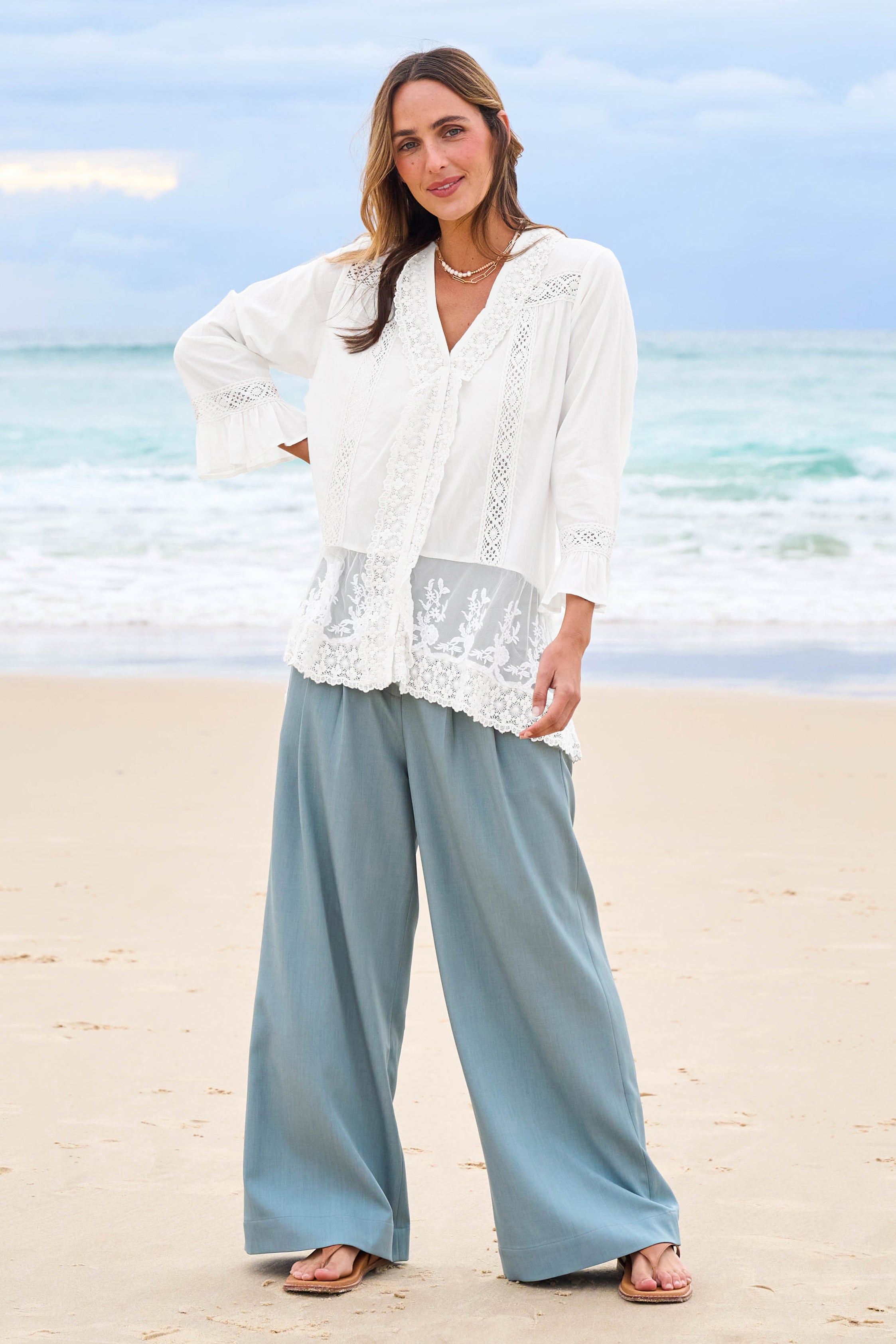 Model Tegan wearing size 10 of the Whispers In The Dark Shirt in colour Milk (White), from the front, showing the whole outfit