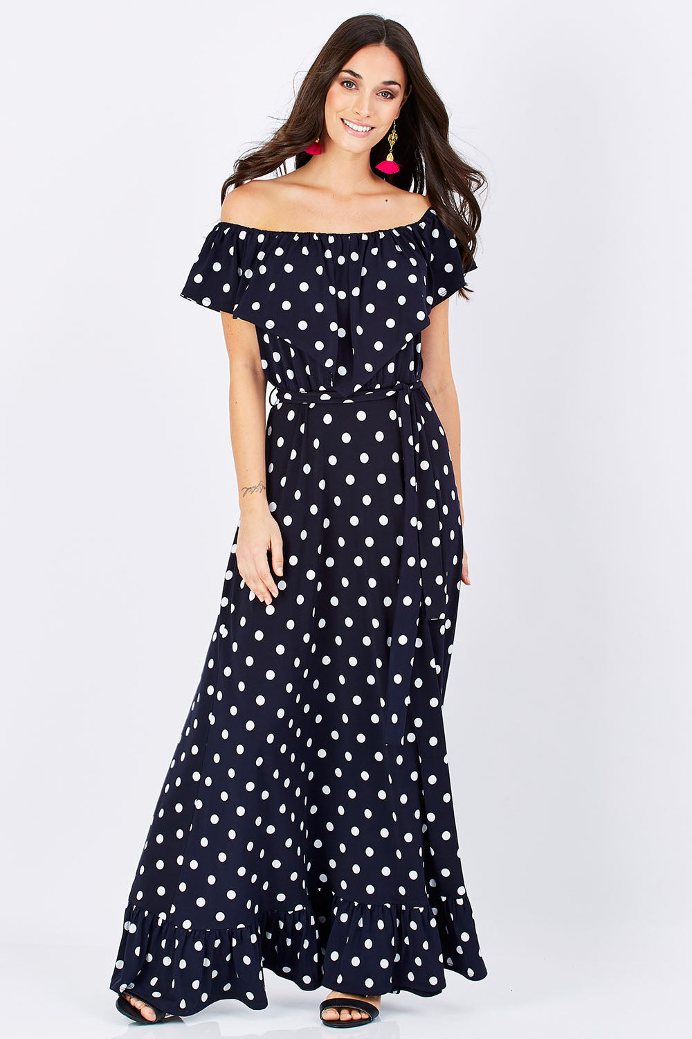 Model Georgia wearing size 10 of the Dance With Me Maxi Dress in colour Navy (Blue), from the front, showing the whole outfit